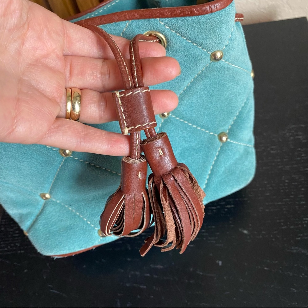 Claudia Firenze Quilted Drawstring
Nubuck Leather Handbag Studded
Bucket Bag - Picture 10 of 16